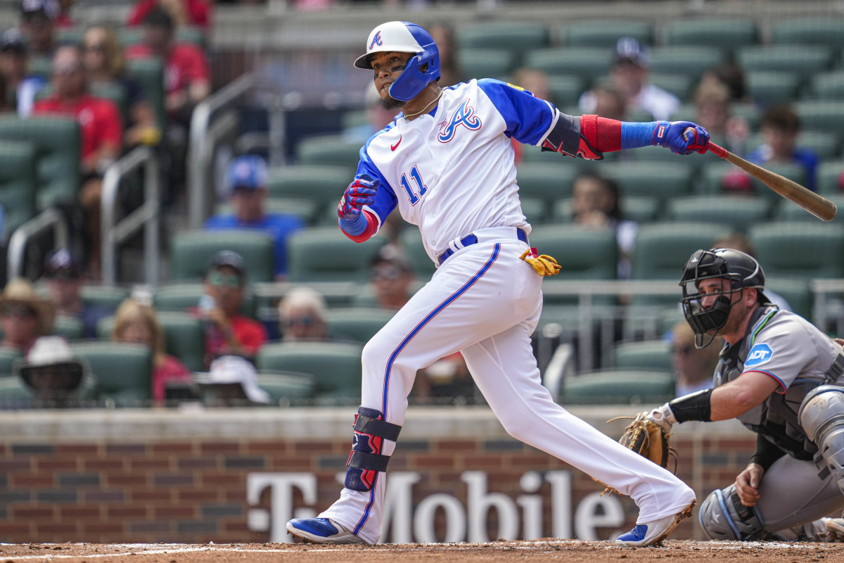 Jul 1, 2023; Cumberland, Georgia, USA; Atlanta Braves shortstop Orlando Arcia (11) doubles to drive in a run against the Miami Marlins during the first inning at Truist Park.